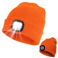 Ciepła czapka zimowa z latarką LED USB – 4 tryby, pomarańczowa