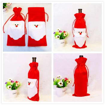 Świąteczne etui na butelkę Mikołaj – czerwone ozdobne opakowanie na wino i prezenty