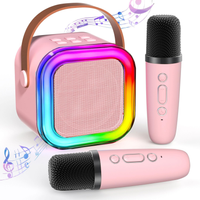 Przenośny zestaw karaoke Bluetooth z 2 mikrofonami i LED RGB – Magic Voice, różowy